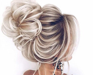 Свадебная прическа - высокий пучок Свадебная прическа - высокий пучок