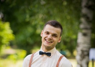 Ведущий Максим Головань - лого